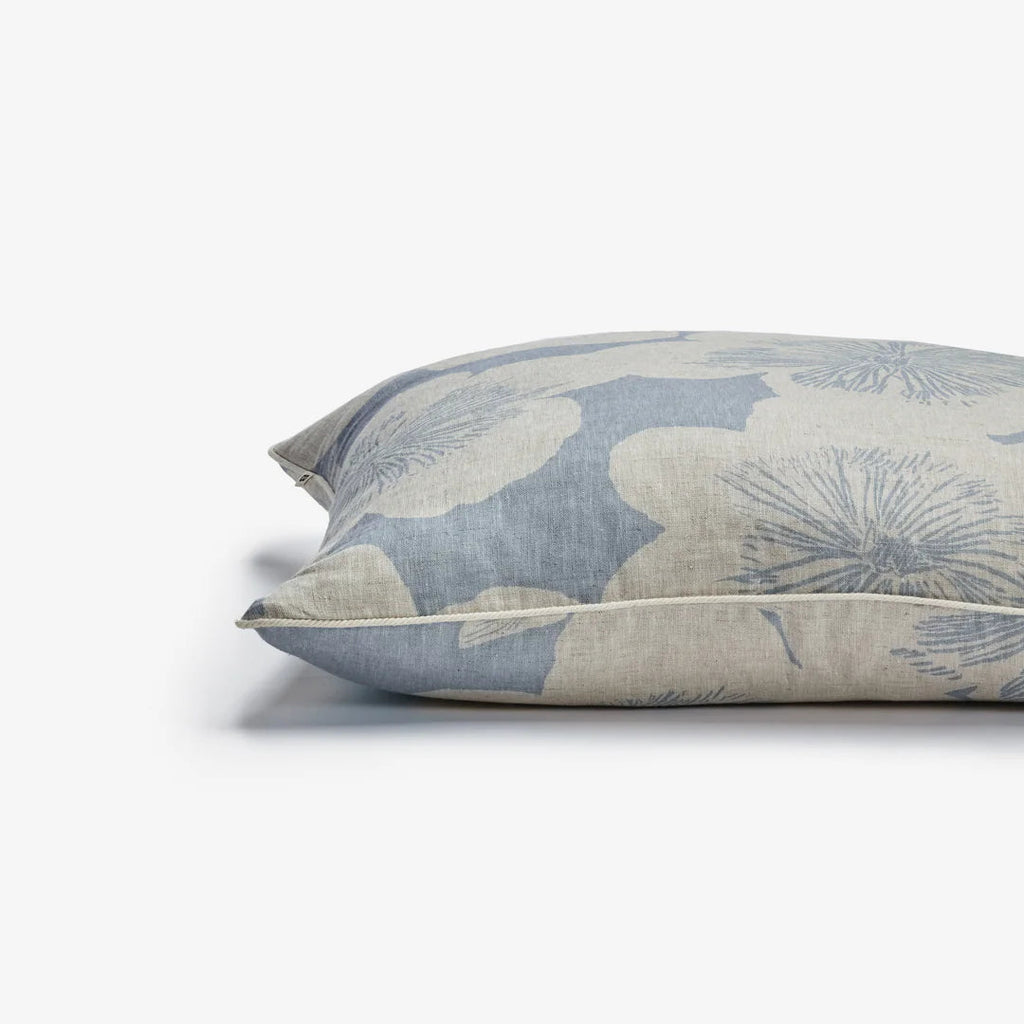 Floral patterned pillow on a white background